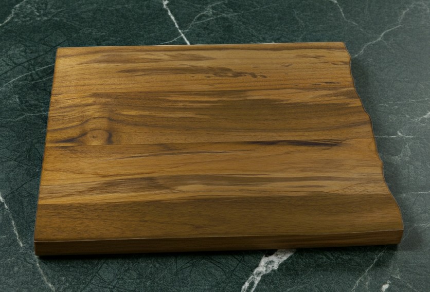Large 16.5-inch North Dakota teak charcuterie board styled for a variety of uses including kitchen decor