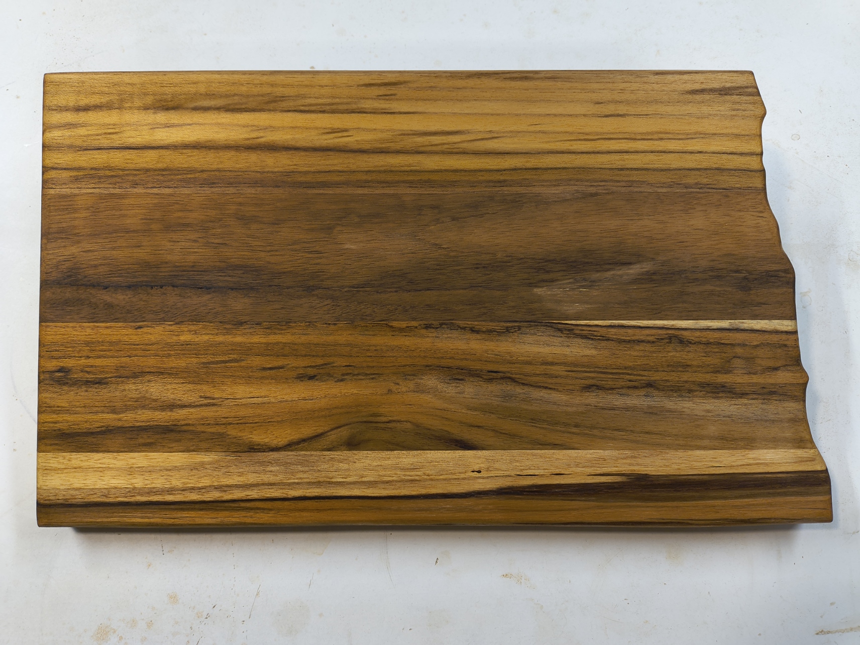 Natural Teak wood grain detail on a durable 1-inch thick North Dakota serving tray