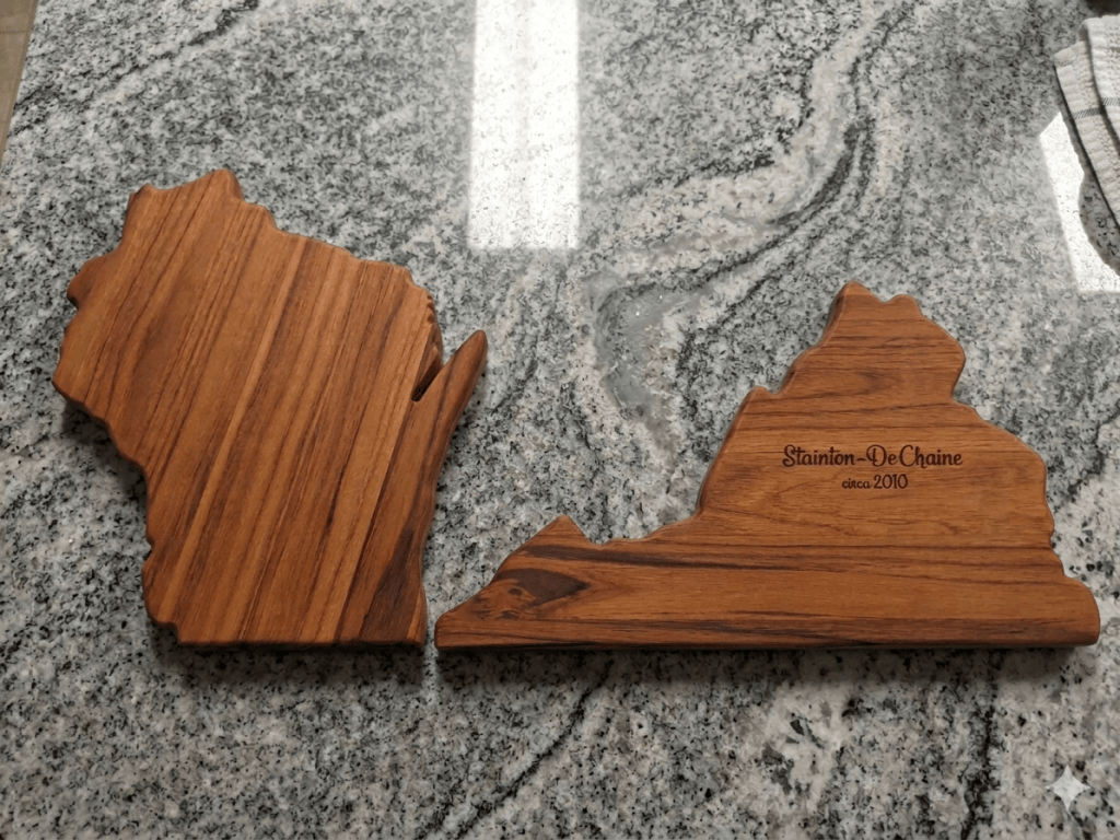 Virginia and Wisconsin state shaped teak boards with personalized anniversary dates.